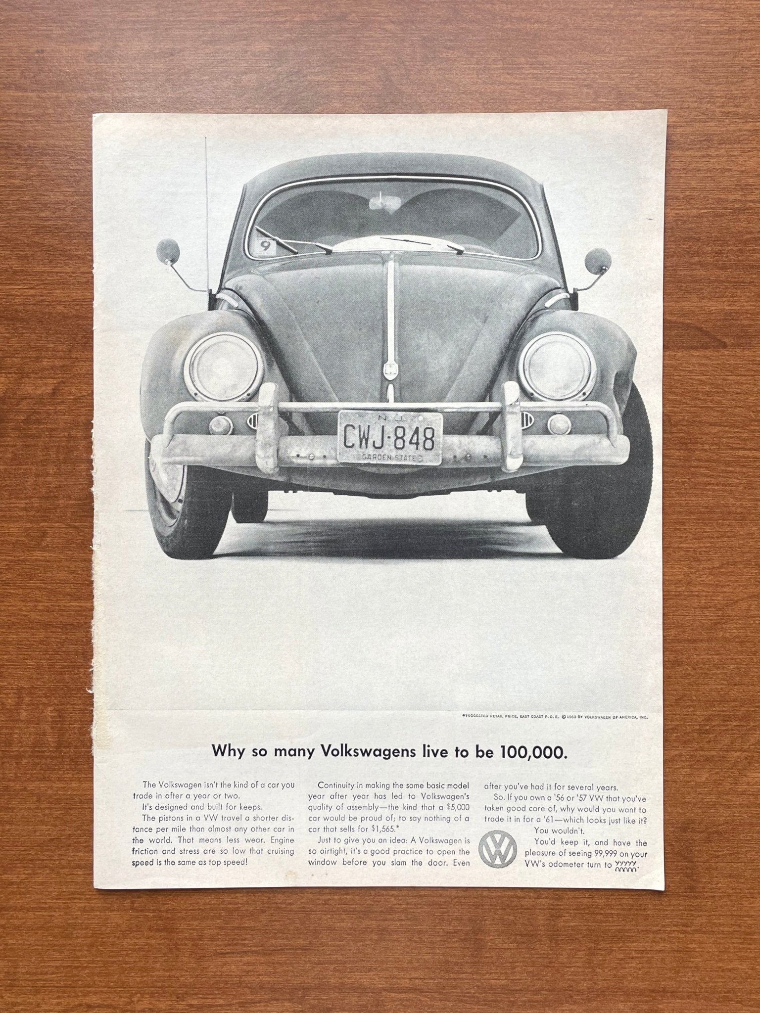 1960 Volkswagen VW Beetle "live to be 100,000" Advertisement