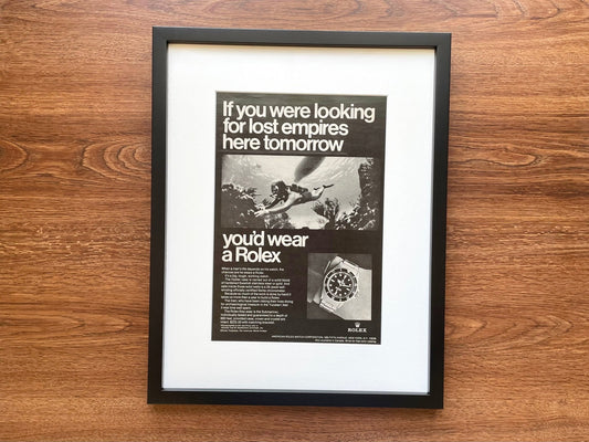 1968 Rolex Submariner "If you were looking for lost empires..." Advertisement in Black Wood Frame