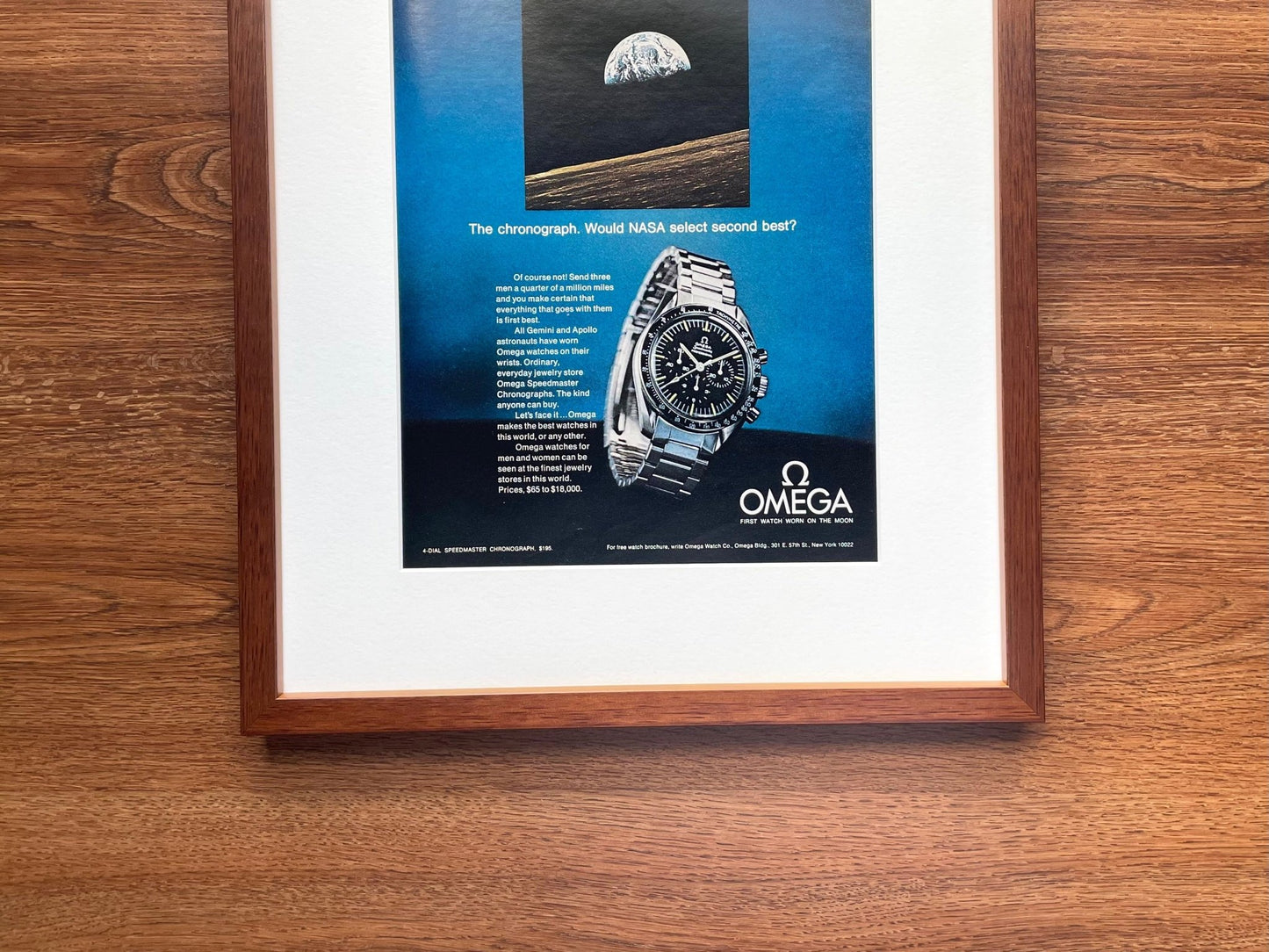 1970 Omega Speedmaster "NASA select second best?" Advertisement in Walnut Wood Frame