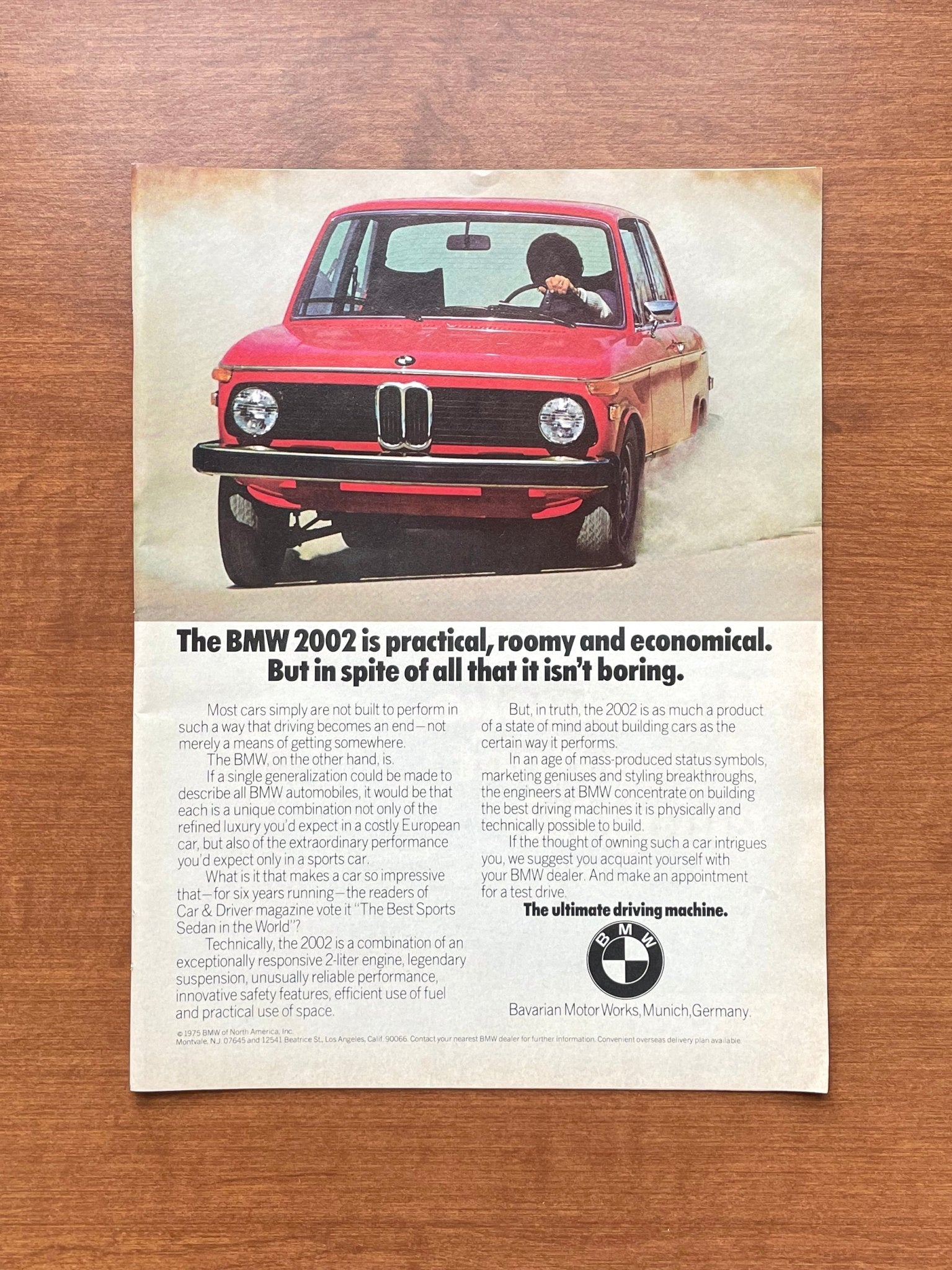 1975 BMW 2002 "it isn't boring" Advertisement