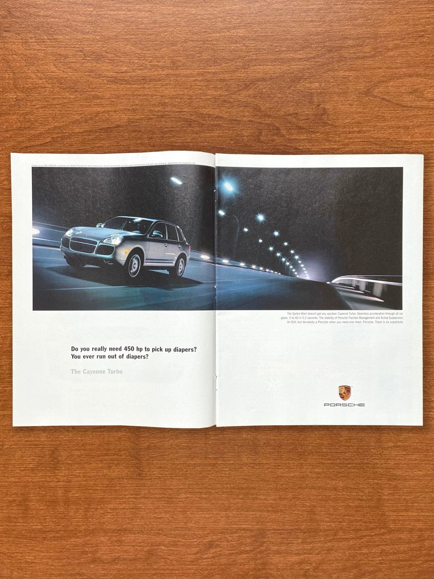 2003 Porsche Cayenne Turbo "ever run out of diapers?" Advertisement