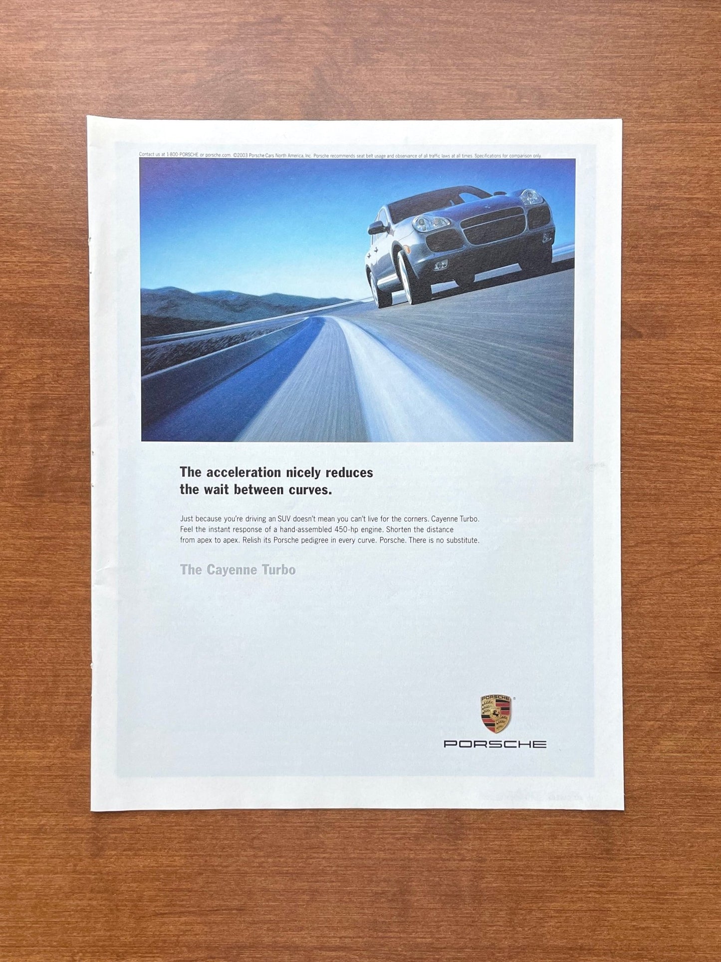 2003 Porsche Cayenne Turbo "reduces the wait between curves" Advertisement