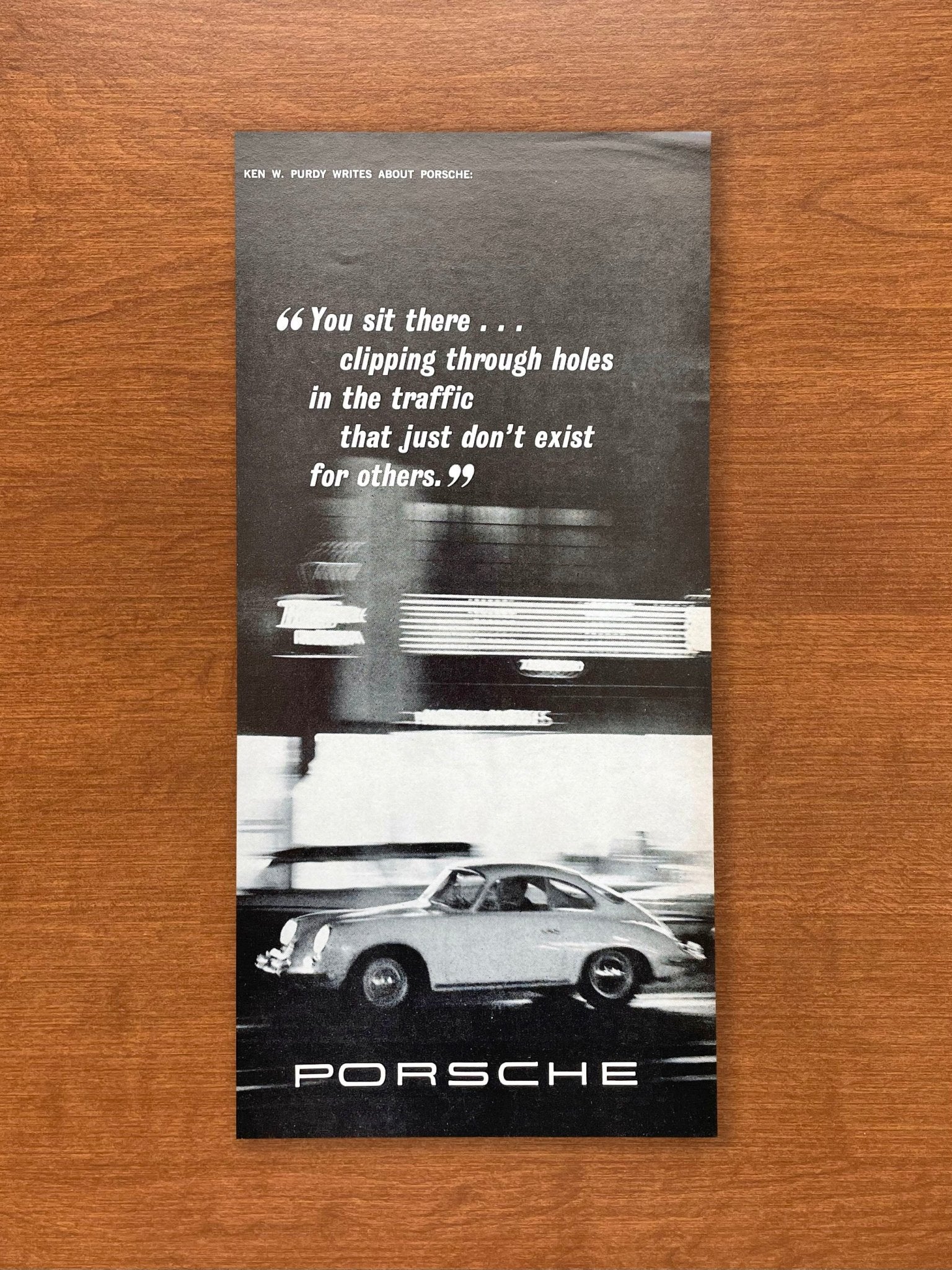 1963 Porsche "clipping through holes in traffic..." Advertisement